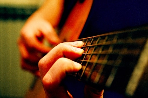 Someone Playing the Guitar - Photo courtesy of ©iStockphoto.com/damircudic, Image #1116206