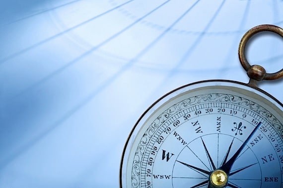 A Compass with Map Background - Photo courtesy of ©iStockphoto.com/DNY59, Image #7346114