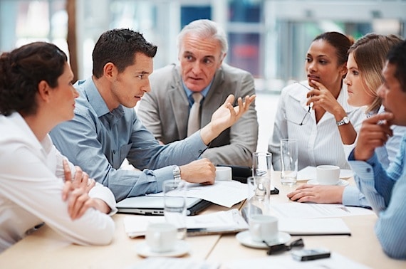 Young Man Being Honest with His Colleagues - Photo courtesy of ©iStockphoto.com/Yuri_Arcurs, Image #12107875